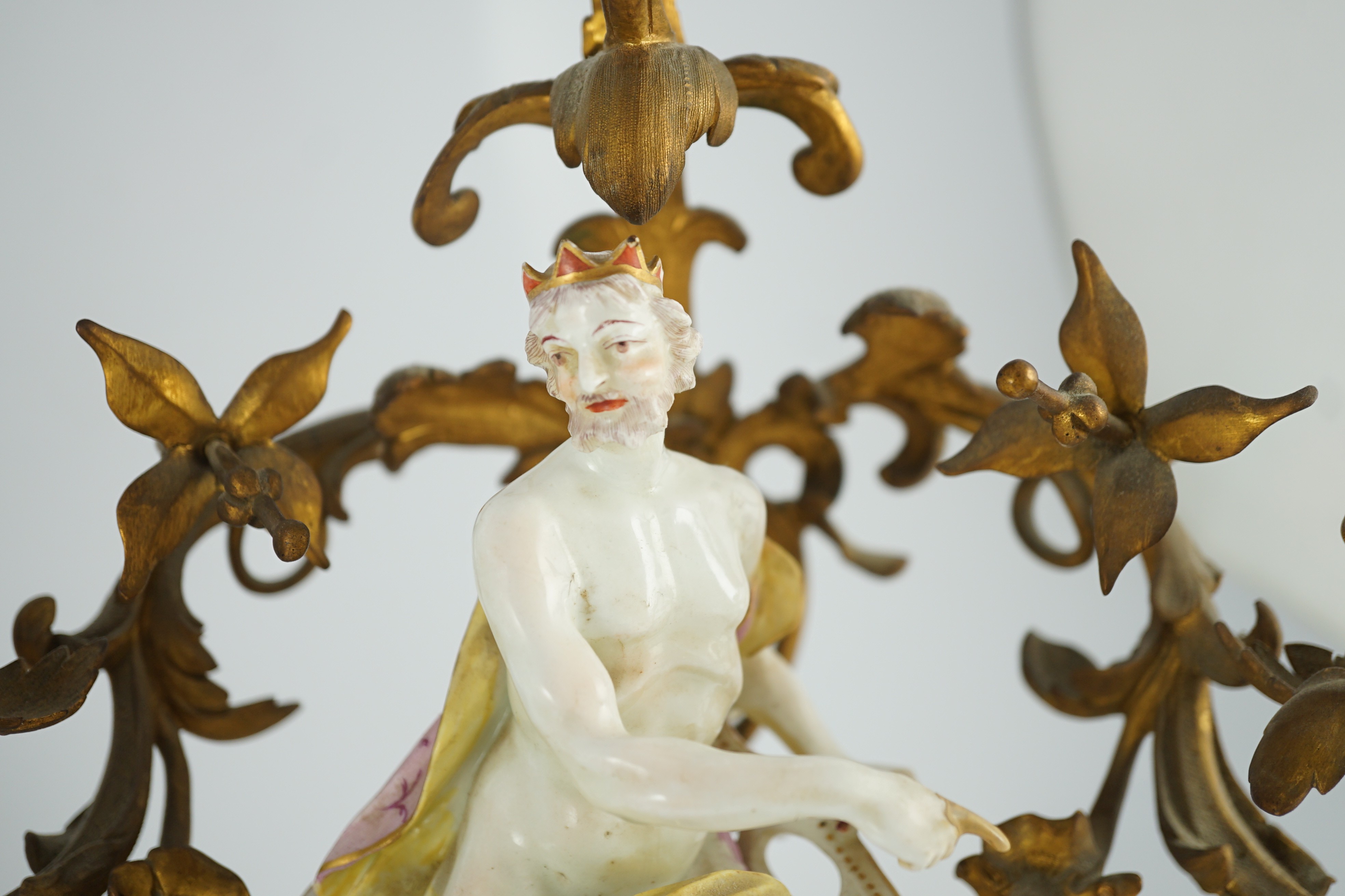 A pair of large Derby porcelain and ormolu mounted ‘Juno and Jupiter’ figural candelabra, the figures c.1760